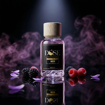 DOSE Burberry her perfume bottle with on a dark surface